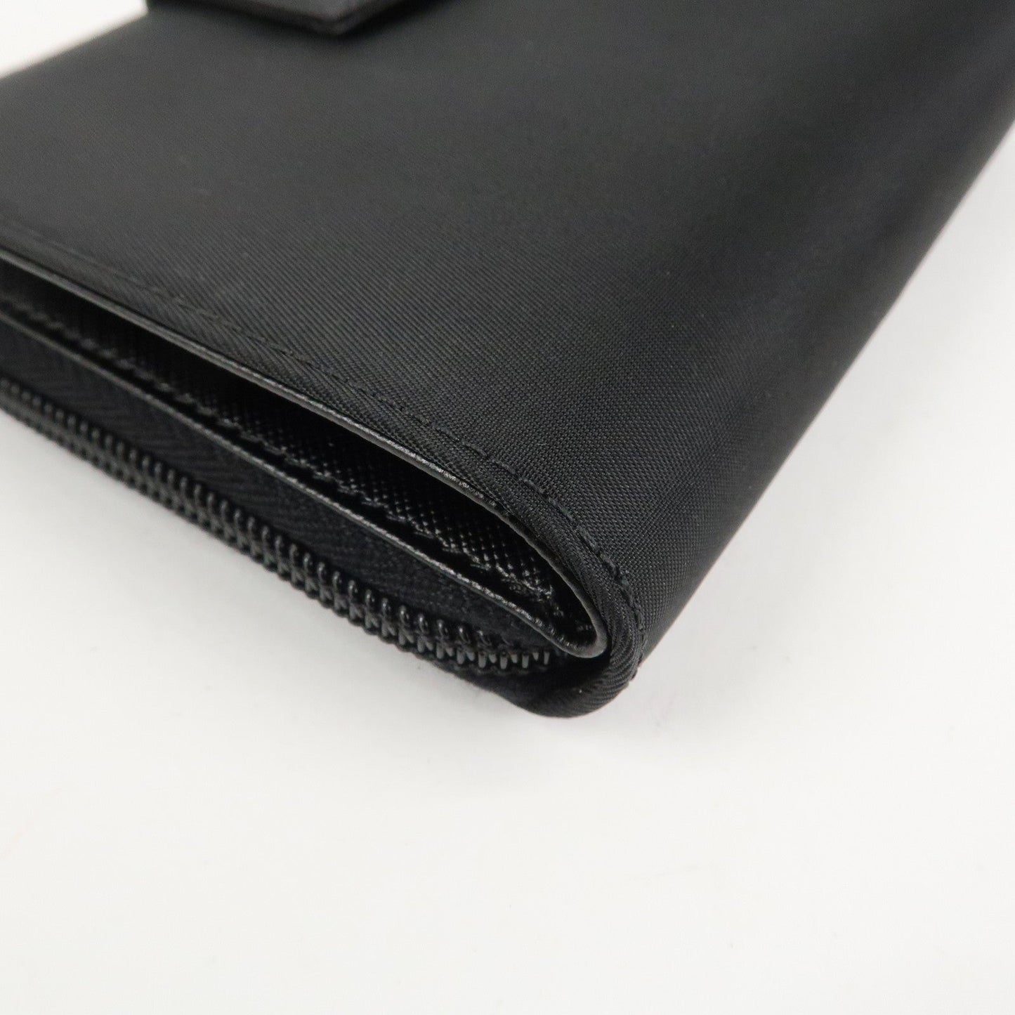 Prada Nylon Saffiano Leather Bi-fold Round zippy Wallet Black Used【Pre-order】